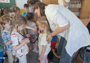 Tuptusie na spotkaniu z Pielęgniarką.