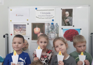 Dawid, Natalka, Nikola, Szymon, Igor ze zniczami wykonanymi metodą origami