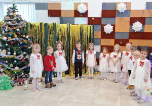 Buziaki na uroczystym Spotkaniu Wigilijnym w Centrum Seniora.